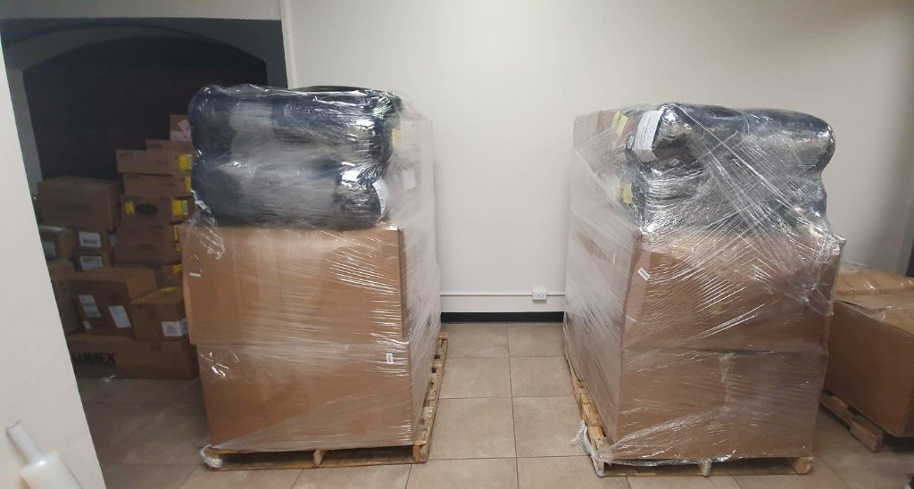 Wrapped pallets staged for international shipping