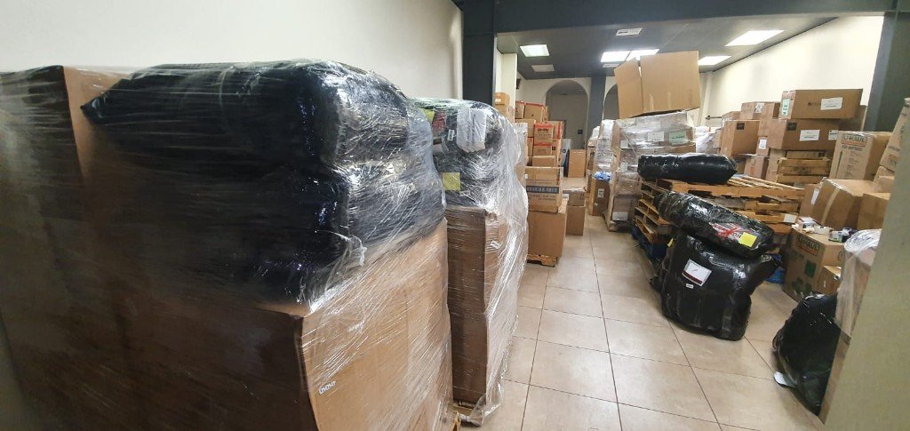 Aisle of palletized freight ready for dispatch